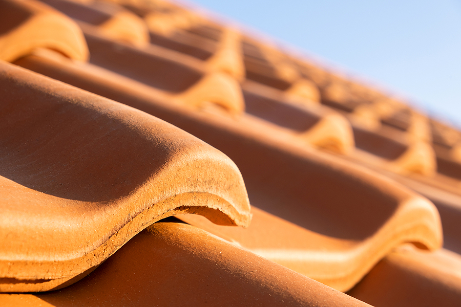 A close-up image of a Spanish tile roofing system.