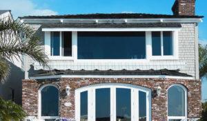Large energy-efficient windows on a two-story home