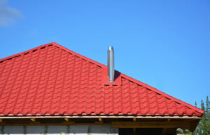 Red metal roof on a home